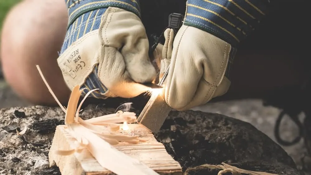 Starting a Fire with a Ferro Rod Wood and metal offer some contrasting benefits in a survival scenario where things like repeatability, weight, and efficiency could mean your life!