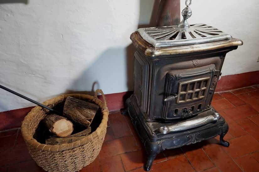 wood stove and firewood for heat