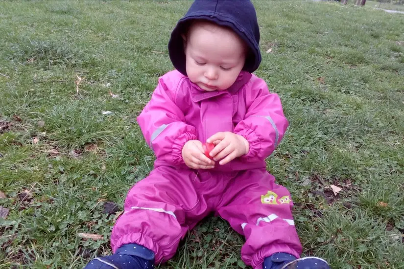 baby in a rain suit