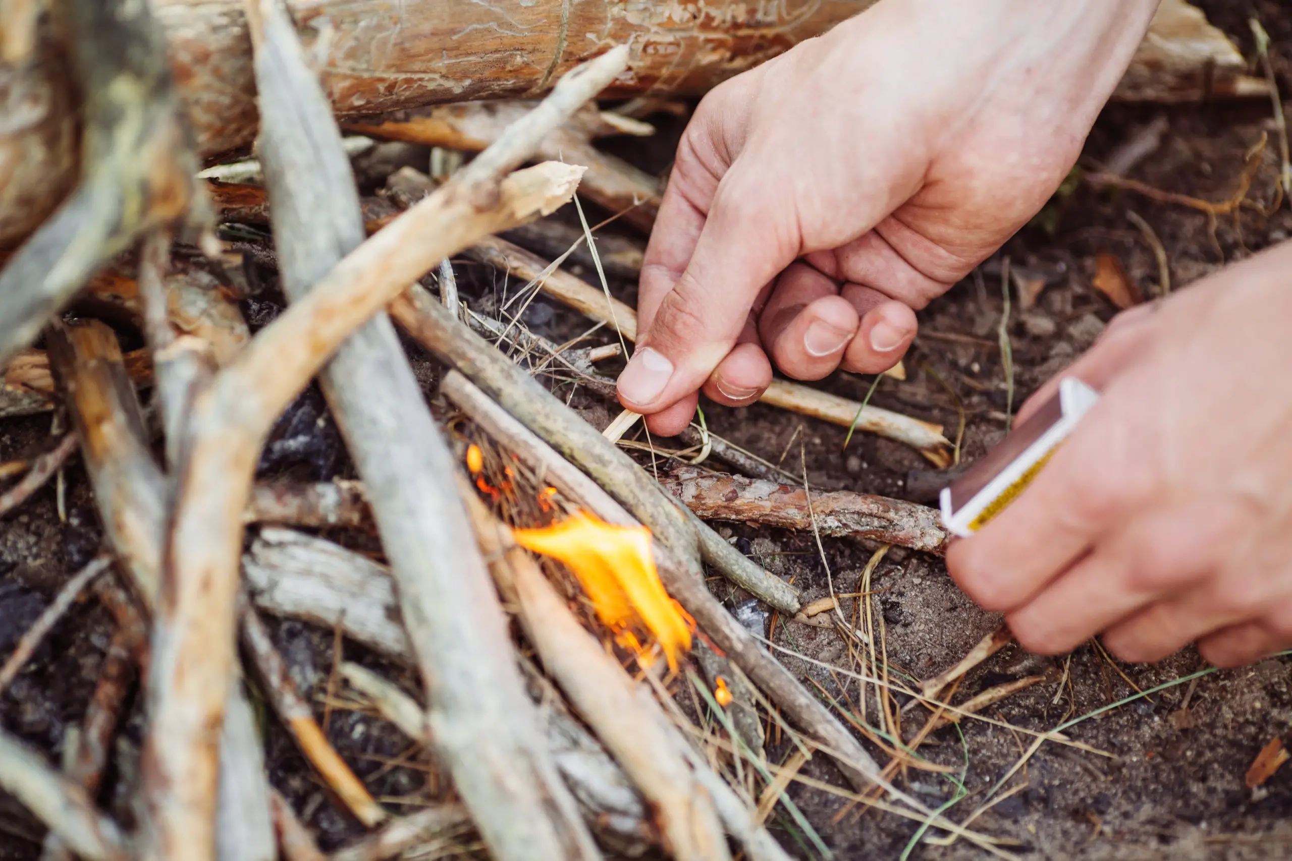 how to start fire with sticks