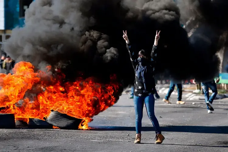 Woman protesting during the street riots