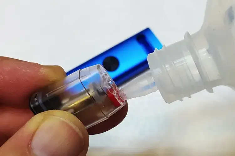 Butane bottle rod inserted inside filling valve